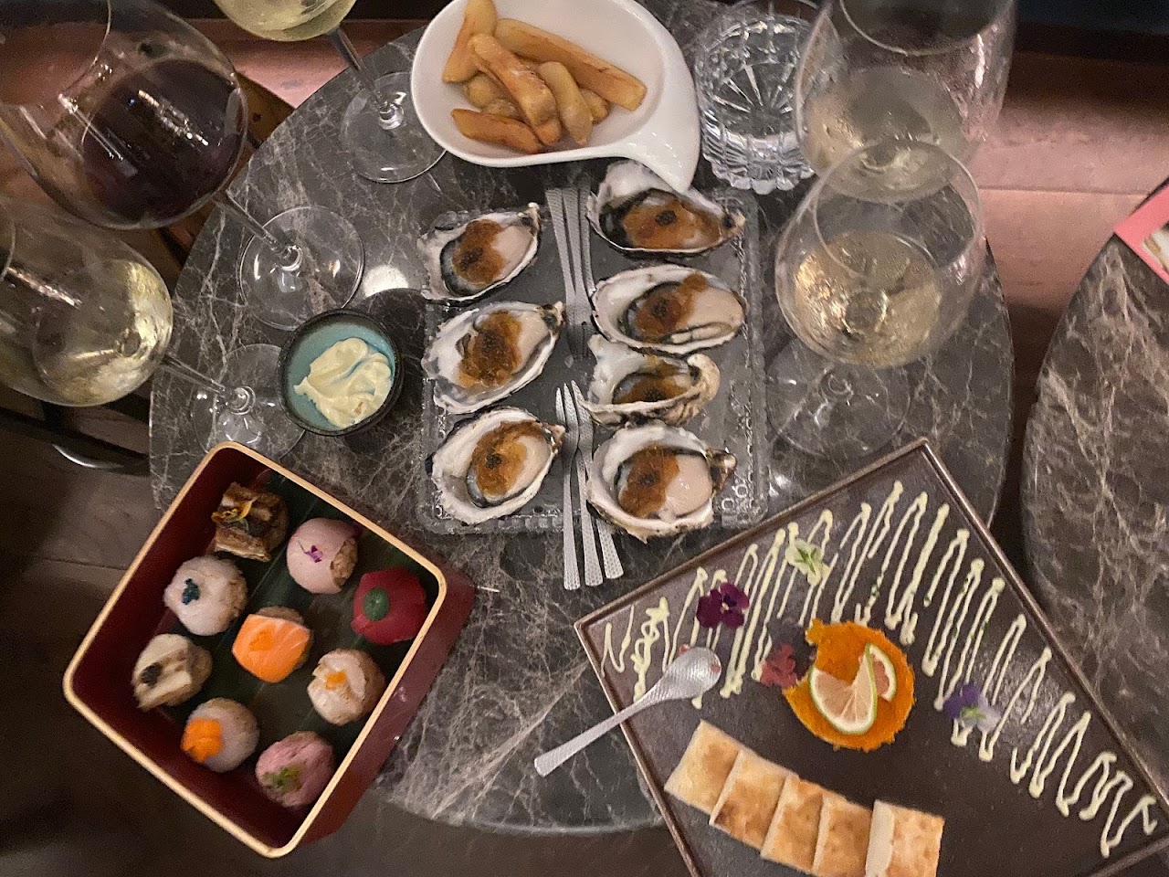 Raw bar selection and small bites arranged for the table.