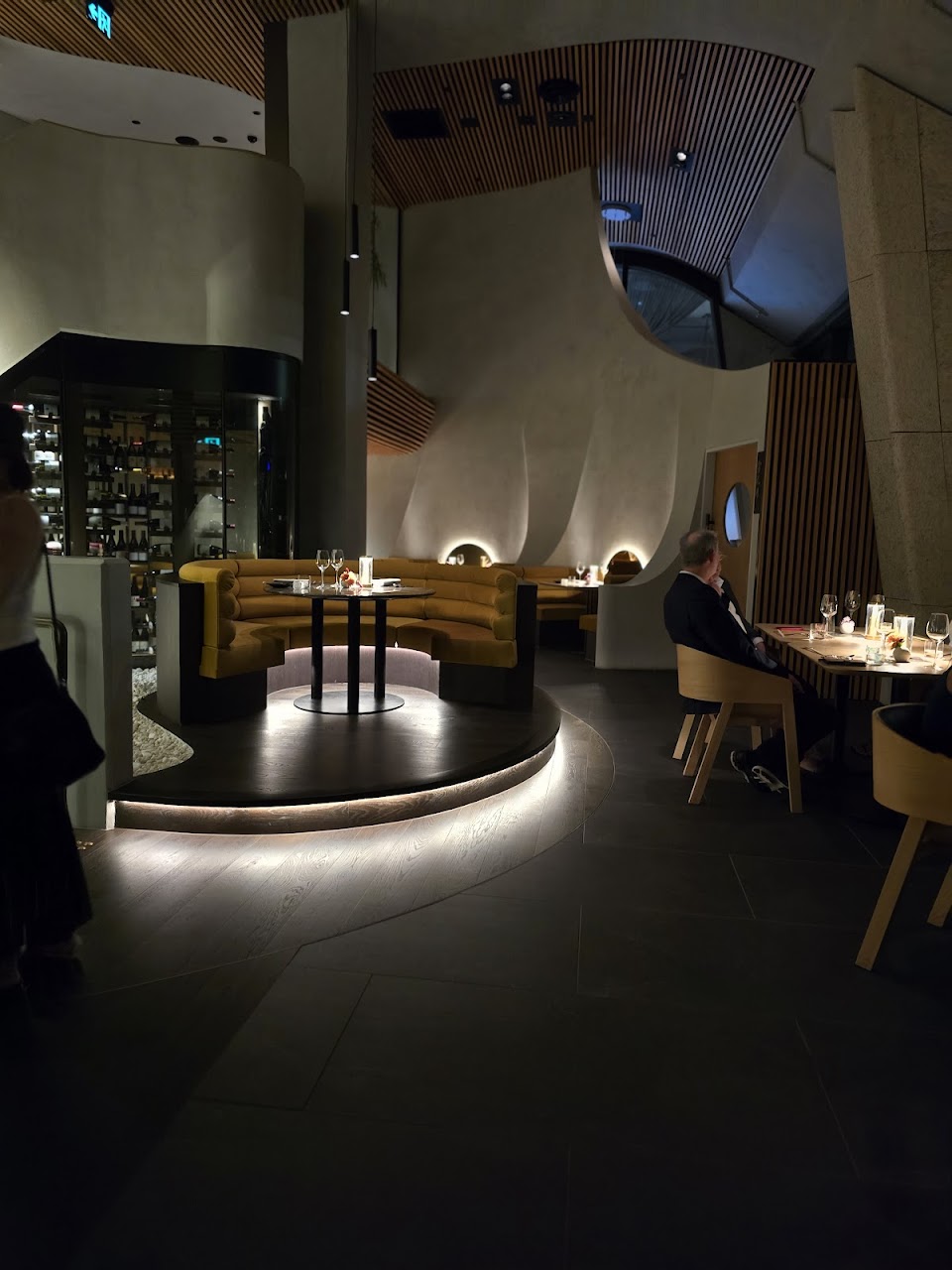 Dimly lit Oborozuki dining room with an intimate service counter.